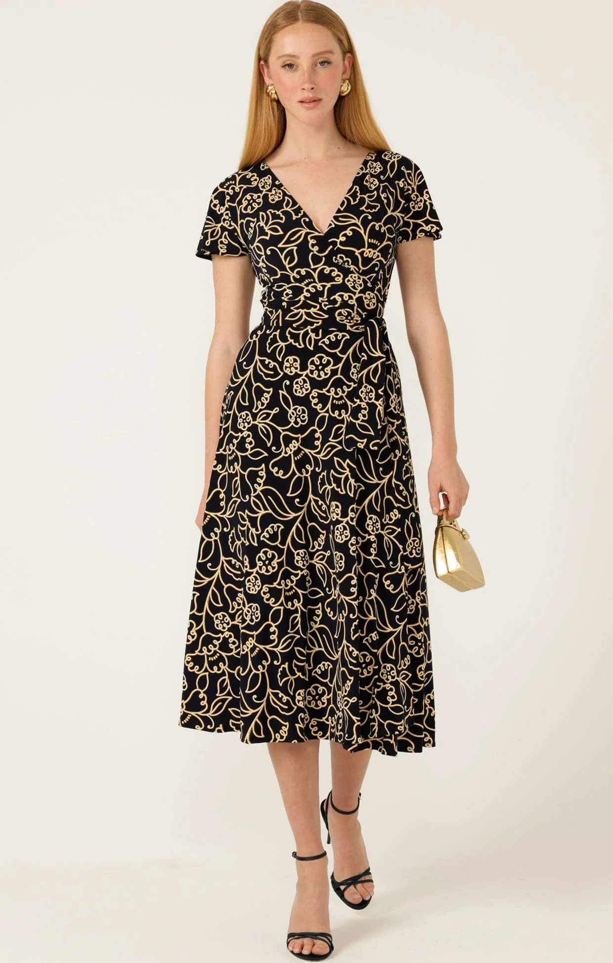 REVERSE WRAP MIDI DRESS IN NAVY GOLD FLOWER