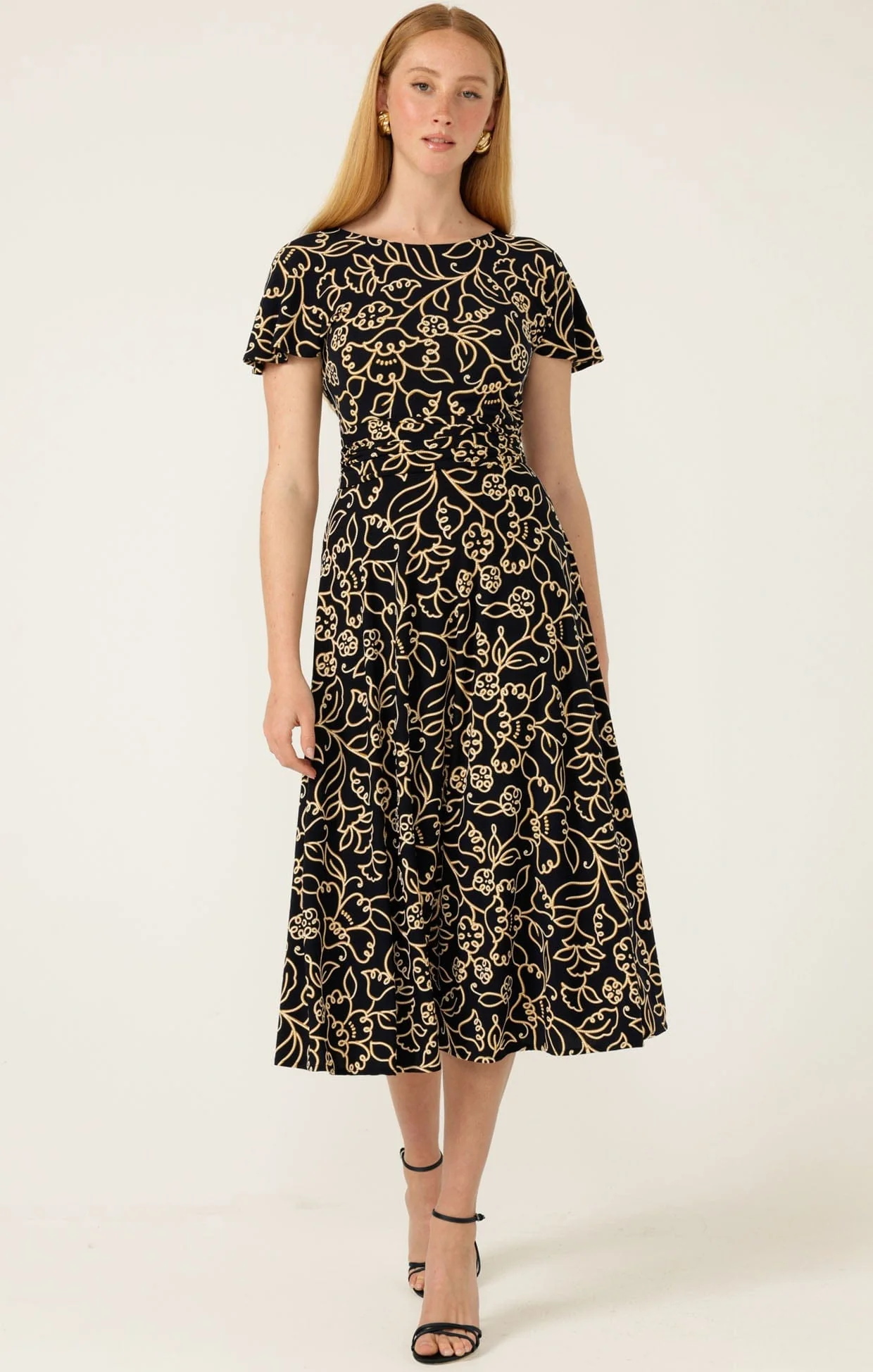 REVERSE WRAP MIDI DRESS IN NAVY GOLD FLOWER - Image 2